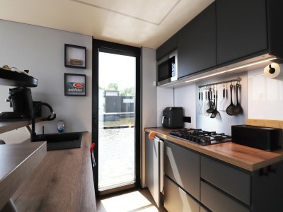 House boat Houseboat with sauna & fantastic view Offingawier - Features photo 19