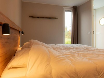 Holiday house Luxury holiday home surrounded by water and forest - Features photo 10