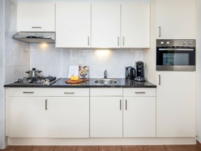 Holiday park Restyled house with fireplace, surrounded by green - Features photo 8