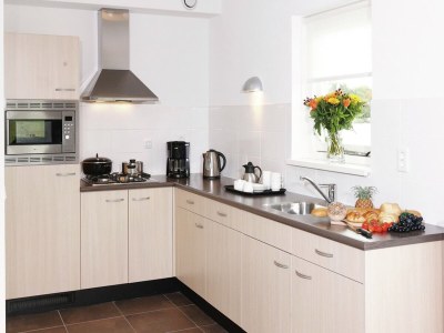 Holiday park Spacious holiday home with garden - Features photo 7