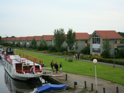 Holiday park Ferienhaus in Steendam mit Garten - Environment photo 11
