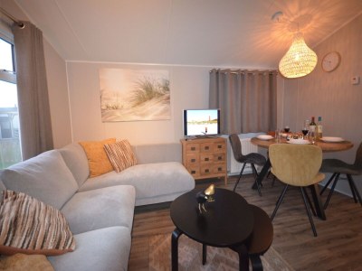 Holiday park Chalet by Wadden Sea with Sunny Garden - Features photo 9