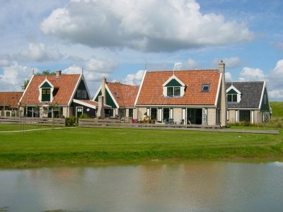 Holiday park Chalet by Wadden Sea with Sunny Garden - Environment photo 26