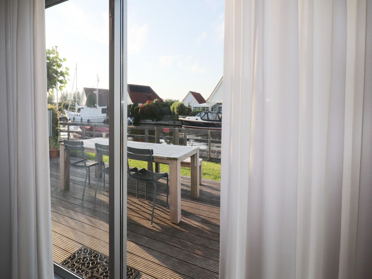 Holiday house Nice holiday home on the water in Grou - Outdoor photo 5