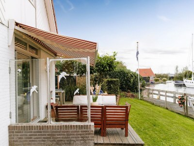 Holiday house Nice holiday home on the water in Grou - Outdoor photo 6