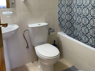 Holiday house Inviting holiday home with pool - Features photo 28