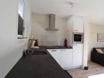 Holiday house Chalet in Friesland mit Terrasse - Features photo 16