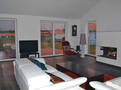 Holiday house Modern and spacious holiday home – only five minutes to the Atlantic - Features photo 7