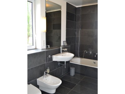 Holiday house Modern and spacious holiday home – only five minutes to the Atlantic - Features photo 15