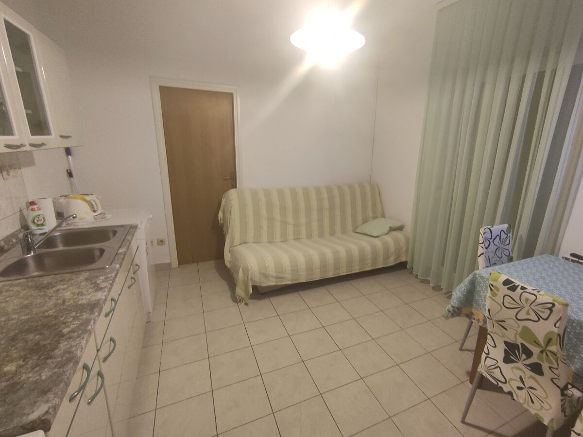 Apartment Two bedroom apartment with terrace and sea view Banjol, Rab A-23095-a - Outdoor photo 3