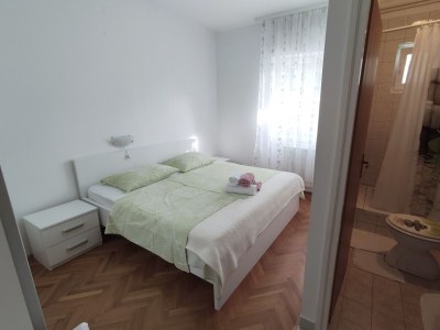 Apartment Two bedroom apartment with terrace and sea view Banjol, Rab A-23095-a - Outdoor photo 6