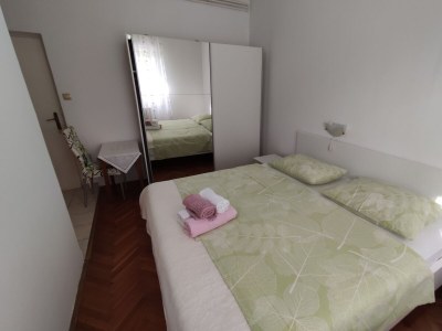 Apartment Two bedroom apartment with terrace and sea view Banjol, Rab A-23095-a - Outdoor photo 7