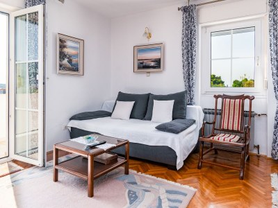 Apartment Two bedroom apartment with terrace and sea view Banjol, Rab A-5022-a - Outdoor photo 17