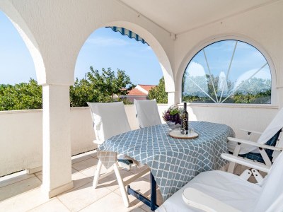 Apartment Two bedroom apartment with terrace and sea view Banjol, Rab A-5022-a - Outdoor photo 37