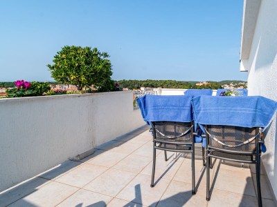 Apartment Two bedroom apartment with terrace and sea view Banjol, Rab A-5022-d - Outdoor photo 23