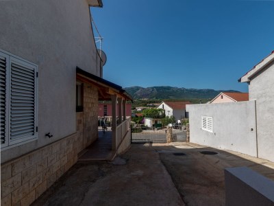 Apartment Two bedroom apartment with terrace Jelsa, Hvar A-134-a - Outdoor photo 9