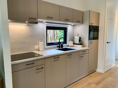 Holiday house Pleasant chalet with veranda - Features photo 10