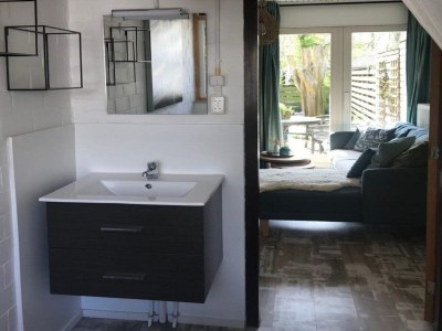 Holiday house Cosy bungalow on quiet resort near beach - Features photo 13