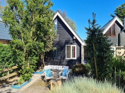 Holiday house Holiday home with large terrace in Sint Maartenszee - Holiday house