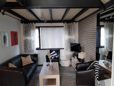 Holiday house Holiday home with large terrace - Features photo 11