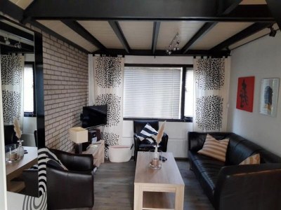 Holiday house Holiday home with large terrace - Features photo 18