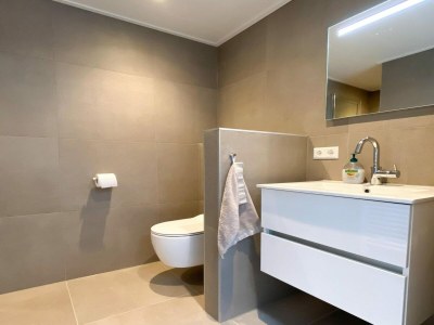 Holiday house Modern & cozy holiday home near beach - Features photo 8