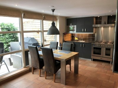 Holiday house Furnished bungalow with garden - Features photo 10