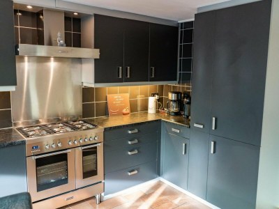 Holiday house Furnished bungalow with garden - Features photo 12