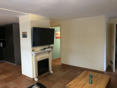 Holiday house Furnished bungalow with garden - Features photo 18