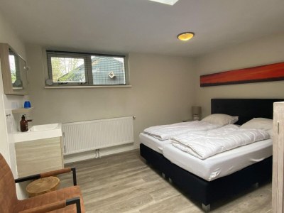 Holiday house Lovely holiday bungalow with garden - Features photo 18