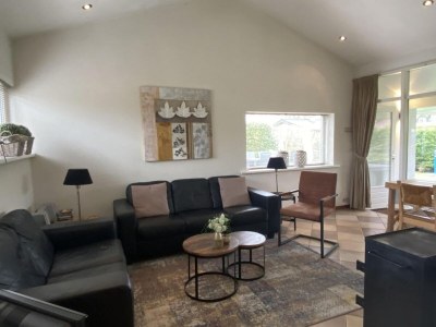 Holiday house Lovely holiday bungalow with garden - Features photo 19