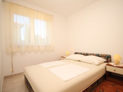 Apartment Two bedroom apartment with balcony and sea view Seget Vranjica, Trogir A-8507-a in Seget Donji - Apartment