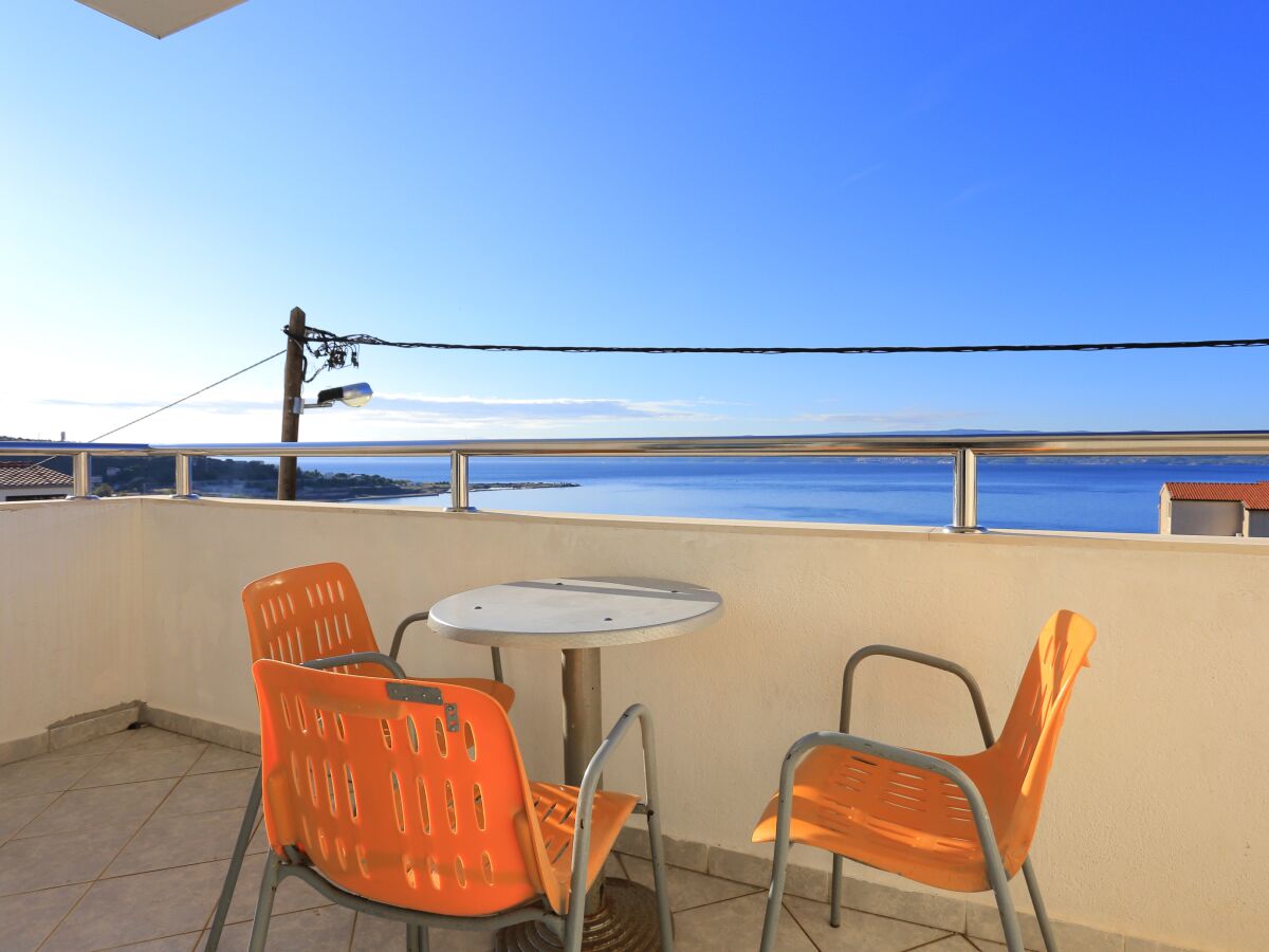 Apartment Three bedroom apartment with terrace and sea view Mali Rat, Omiš A-7482-b