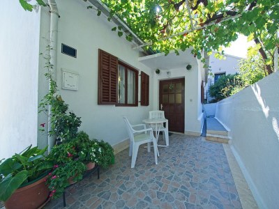 Apartment Two bedroom apartment with terrace and sea view Postira, Brač A-11168-a - Outdoor photo 5
