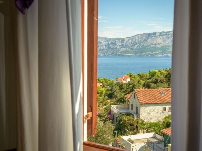 Apartment Two bedroom apartment with terrace and sea view Postira, Brač A-11168-a - Outdoor photo 27