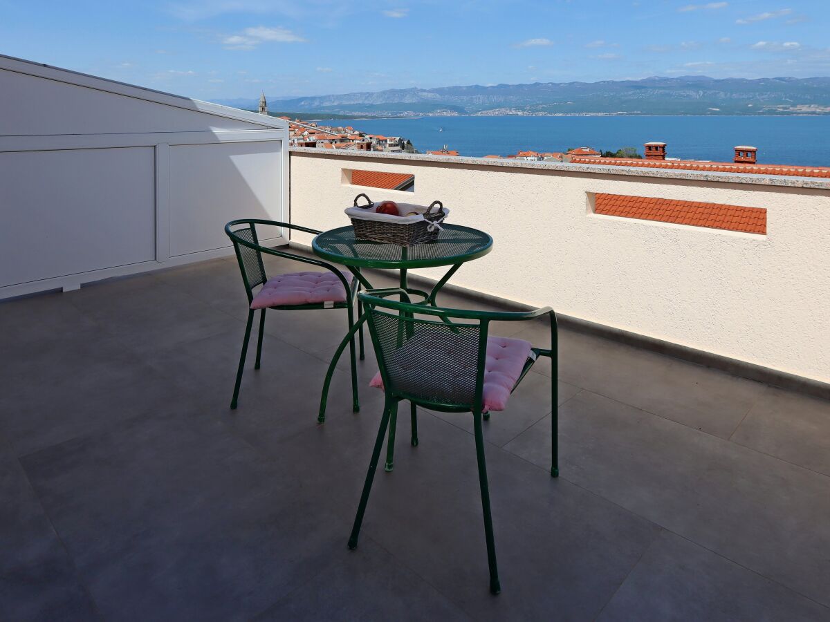 Holiday room with terrace and sea view Vrbnik, Krk S-5299-a