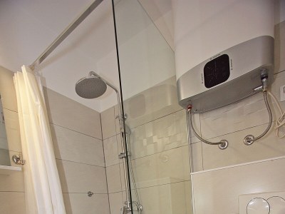 Apartment Three bedroom apartment with terrace and sea view Supetar, Brač A-5665-a - Outdoor photo 25