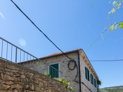 Apartment Two bedroom apartment with terrace Postira, Brač A-19107-a - Outdoor photo 6