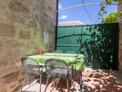 Apartment Two bedroom apartment with terrace Postira, Brač A-19107-a - Outdoor photo 29