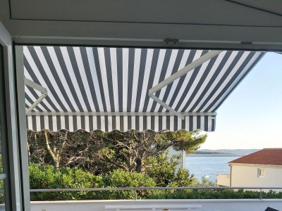 Apartment Two bedroom apartment with terrace and sea view Povljana, Pag A-17222-a - Outdoor photo 12