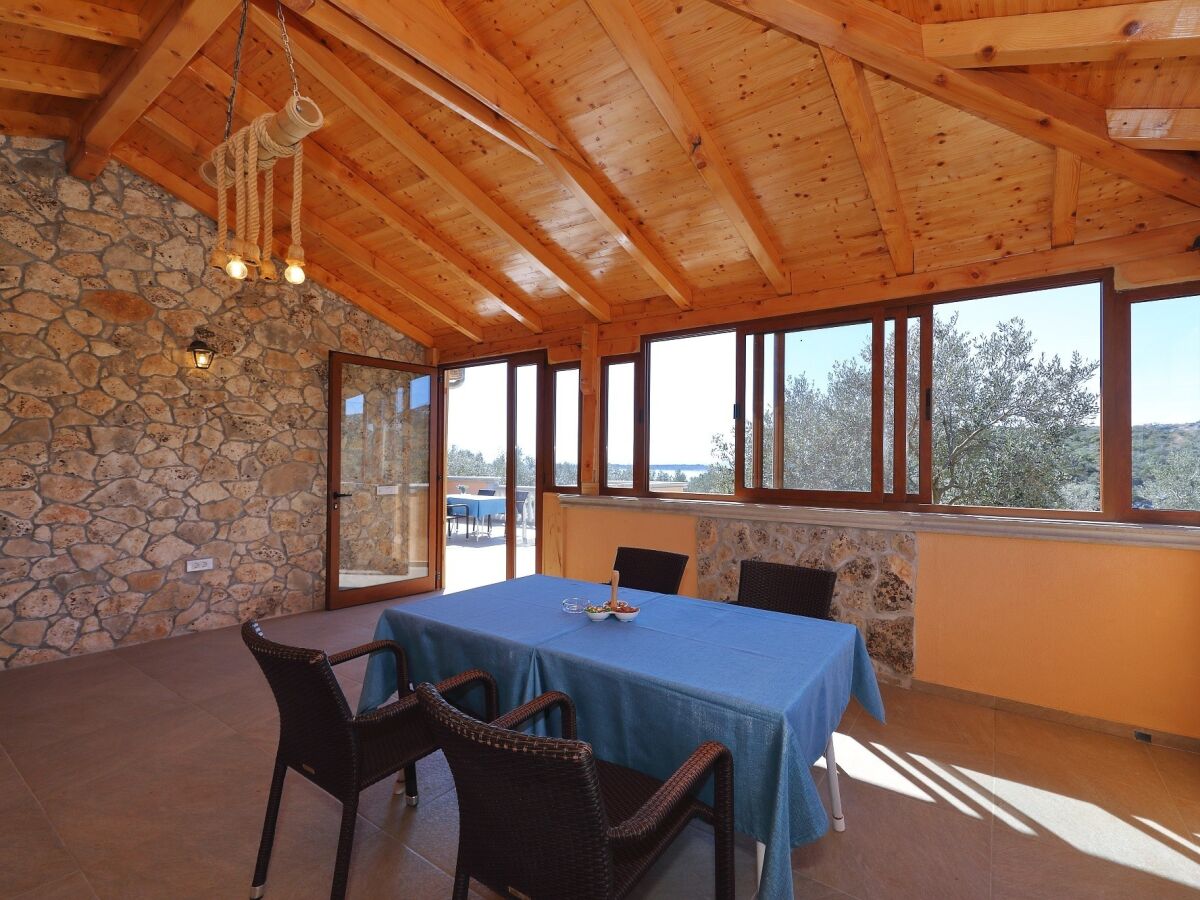 Holiday house One bedroom house with terrace and sea view Cove Triluke, Pašman K-20973