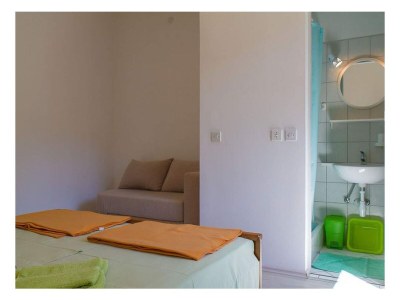 Apartment Two bedroom apartment with terrace and sea view Banjol, Rab A-22421-a - Outdoor photo 18