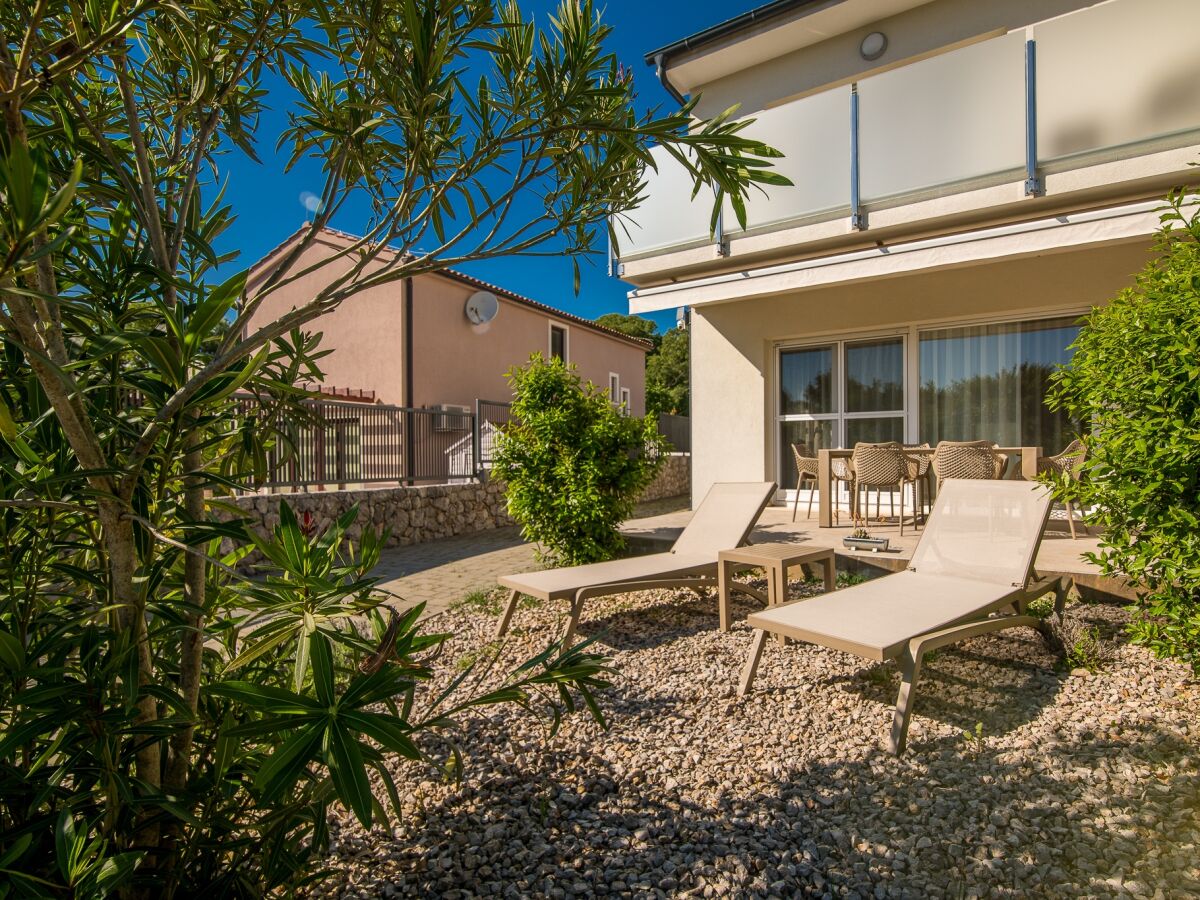 Holiday house Three bedroom house with terrace and sea view Ljutići, Krk K-23630