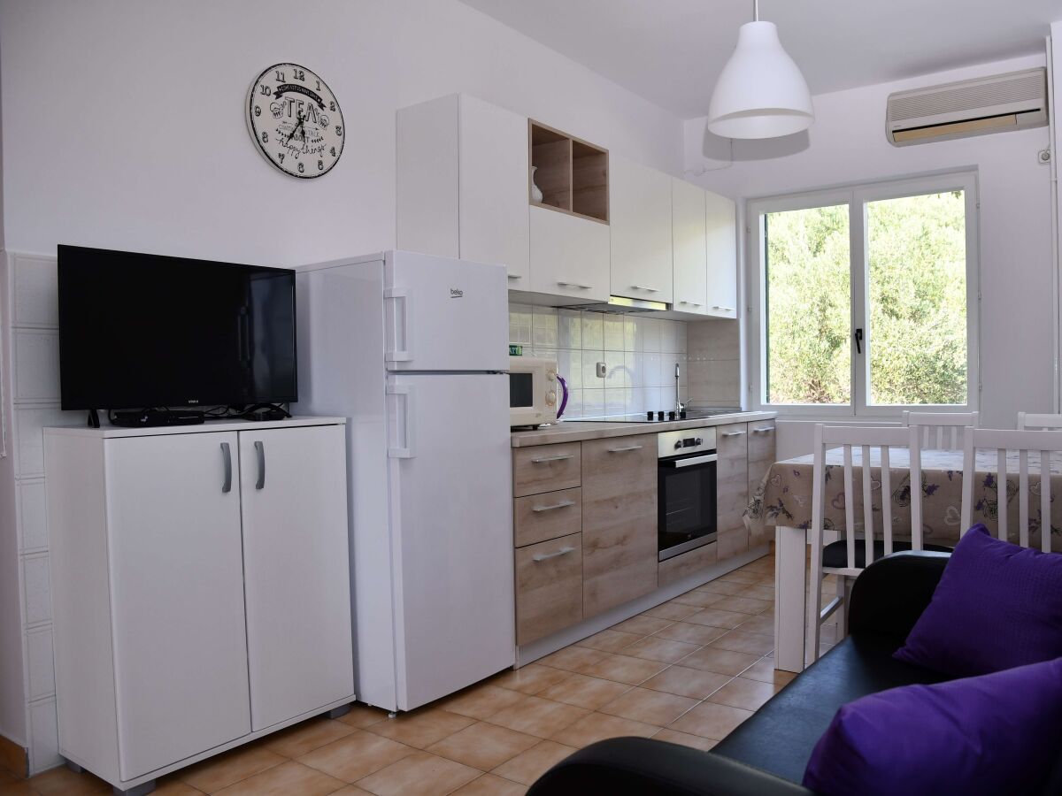 Apartment Two bedroom apartment with balcony and sea view Banjol, Rab A-23240-a - Outdoor photo 5