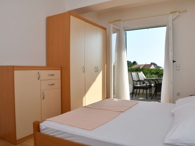 Apartment Two bedroom apartment with balcony and sea view Banjol, Rab A-23240-a - Outdoor photo 6