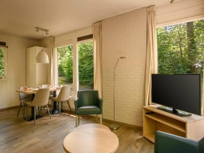 Holiday park Stylish Forest Bungalow for 4 in the Veluwe - Features photo 2