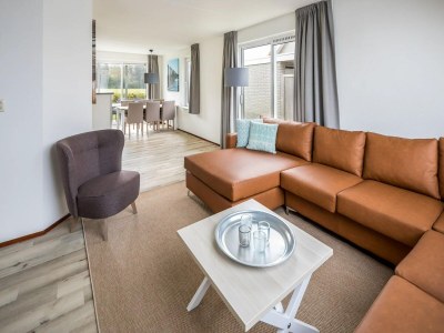 Holiday park Bungalow with Private Sauna by the Coast - Features photo 9