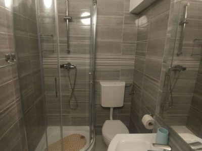 Holiday house Four Bedroom Holiday Home With Terrace & Sea View - Features photo 10