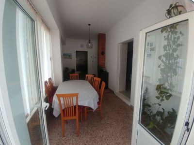 Holiday house Four Bedroom Holiday Home With Terrace & Sea View - Features photo 12