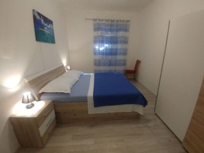 Holiday house Four Bedroom Holiday Home With Terrace & Sea View - Features photo 14